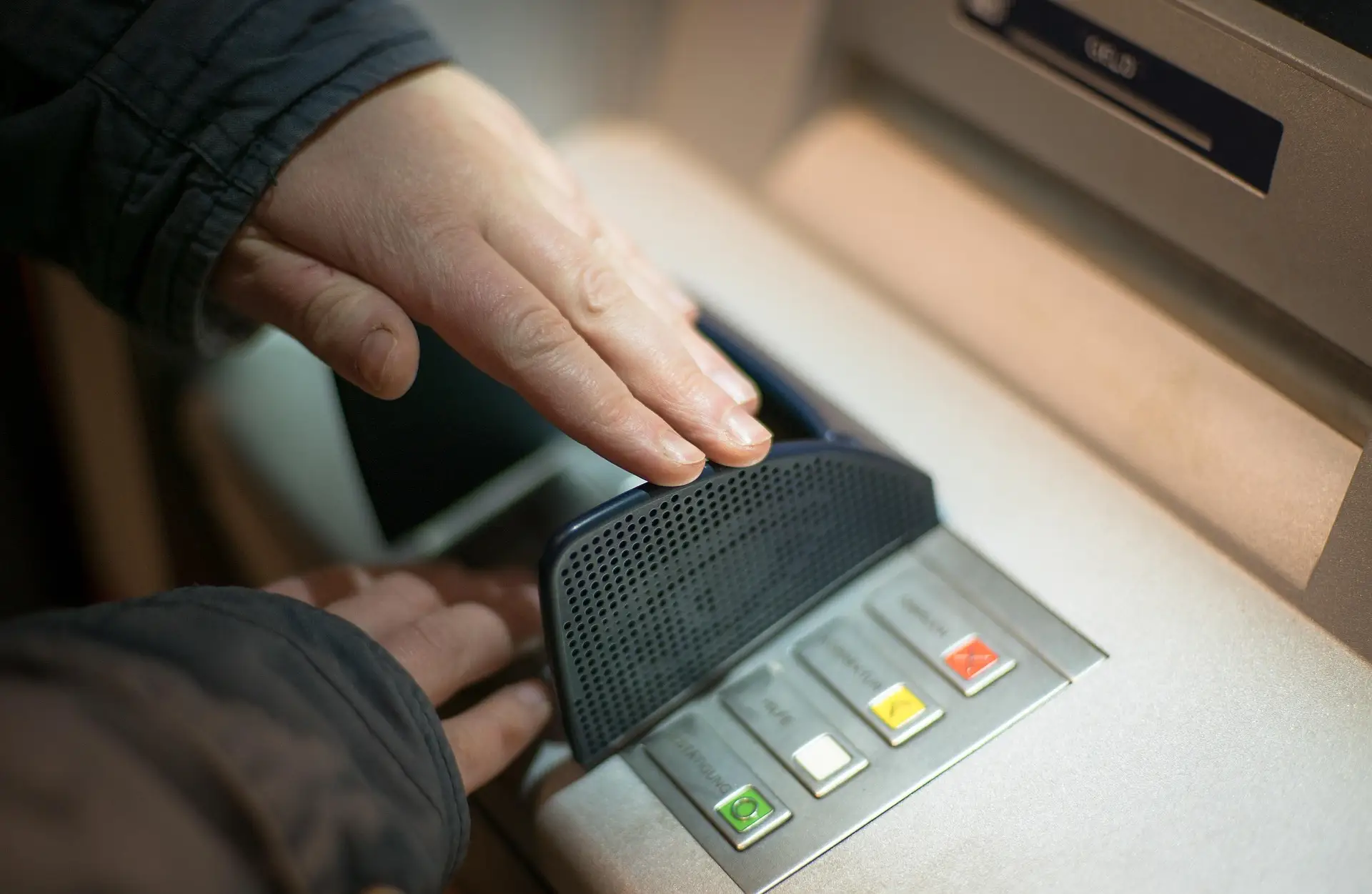 Hand shielding PIN entry at a cash machine